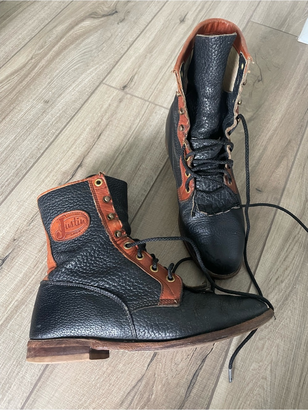 Justin Boots Kiltie Black and Brown Two-Tone Leather Lace-Up Boots